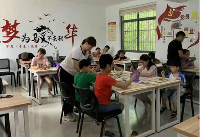 新化社区暑期书法公益兴趣班 教育项目的研究、开发与社区文化实践